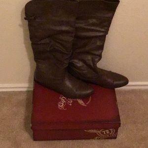 Worn boots by Faded Glory